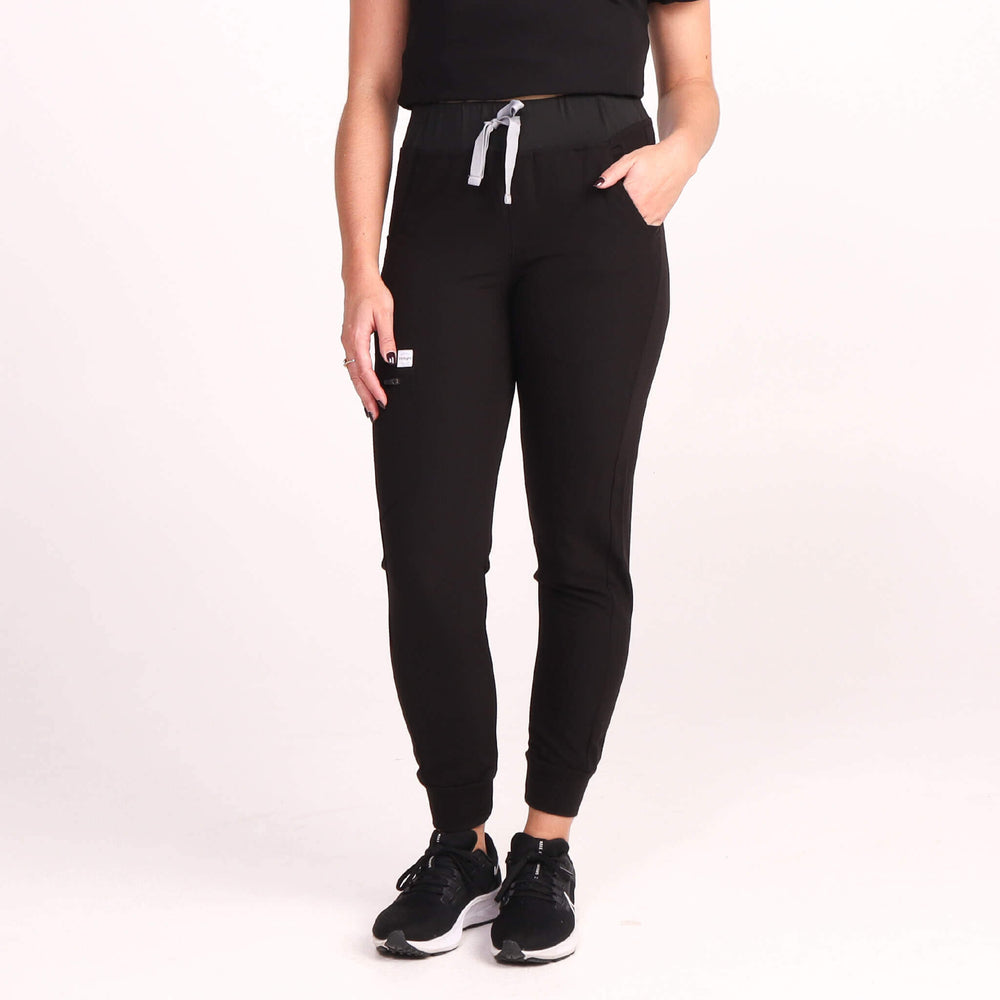 Nurse wearing Black Medical Scrub Jogger Pants and Black Medical Scrub Top from Fit Right Medical Scrubs Australia